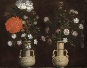 Two Grey Terracotta Vases With Flowers