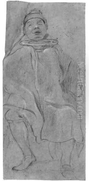 A seated man looking up - view 1