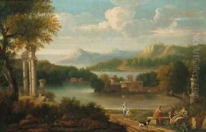 Figures resting before a lake in an Italianate landscape