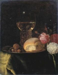 A Roemer Of White Wine, A Bread
Roll And Nuts On A Silver Plate,together With Roses On A Green-draped
Table A Roemer Of White Wine, A Bread
Roll And Nuts On A Silver Plate,together With Roses On A Green-draped
Table