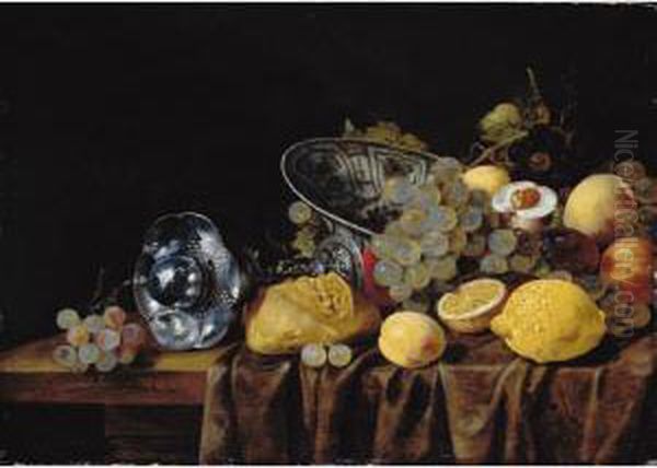 A Still Life Of Lemons, Grapes
And Peaches, With A Bread Roll And A Silver Pokal On A Partly Draped
Table - view 1