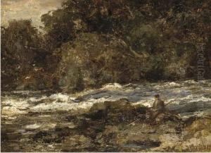 An Angler On The Bank Of A Rocky River An Angler On The Bank Of A Rocky River