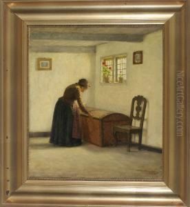 Frau An Einer Truhe Im Interieur by Valdemar Magaard