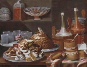 Cakes, Bread, Fruit, A Rose,
Savoiardi Biscuits And Glasses Onpewter Plates With Bottles In Pails And
Decorated Boxes On A Partlydraped Table, White And Blue Porcelain Cups
And Bowls With A Glassjar On A Ledge by Carlo Magini