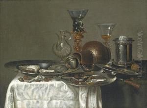 Oysters And Hazelnuts On Pewter 
Plates With A Stoneware Jug, A Silver Brazier And Glasses On A Table 
Draped With A White Cloth by Cornelis Mahu