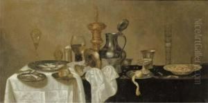 An Upturned Tazza, A Roemer, A
Facon-de-venise Glass, Oysters, A Bun, A Lemon, A Knife And A Tazza On
Pewter Plates, With A Porcelain Bowl On A Partly-draped Ledge by Cornelis Mahu