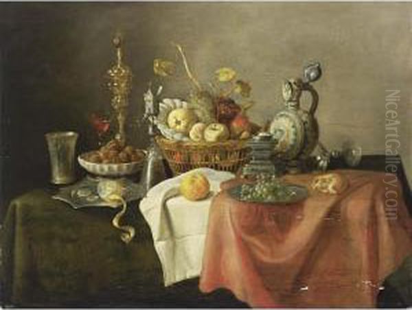A Sumptuous Still Life With A
Silver-gilt Beaker, A Lemon On A Silver-gilt Pointed Dish, Walnuts In A
Porcelain Bowl, A Silver Gilt Cup With Cover, A Silver-gilt Mill Glass, A
Quince, An Apple, A Peach, Grapes, And Oranges In A Basket Together
Wit - view 1
