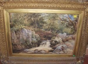 Angler By A Rocky Woodland Waterfall