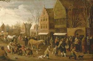 A town view with figures gathered in the street by Joost Cornelisz. Droochsloot