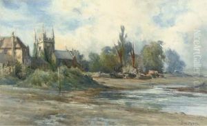 A Church Beside A River Bank At Low Tide
