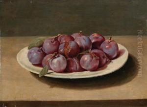 Plums On A White Dish On A Table Plums On A White Dish On A Table