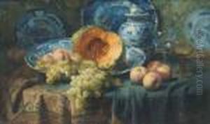 A Pumpkin, Peaches, And Grapes In A China Bowl By Glasses On Adraped Table by Frans Mortelmans
