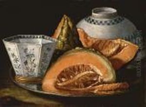 Melon And An Octagonal Cup On A Silver Charger, An Upturned Bowl Behind