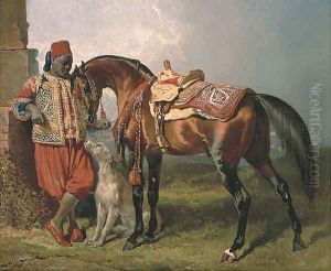 An African groom holding a stallion, with a dog