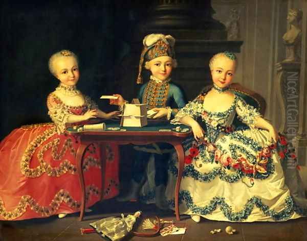 A boy and two girls building a house of cards with other games by the table - view 1