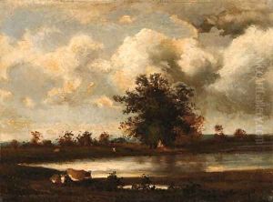 Cows watering by the river's edge
