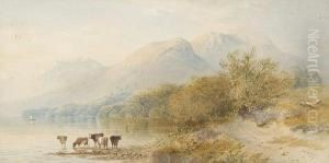 Cattle Beside A Lake With Mountainsbeyond