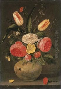 Roses, Tulips, Carnations And 
Other Flowers In A Stoneware Vase With Ornamental Relieves On A Stone 
Ledge