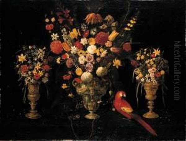 Tulips, Carnations, Irises,
Daffodils, Hyacinths And Other Flowersin Three Ornamental Silver-gilt
Standing Cups With A Parrot And Achained Squirrel - view 1