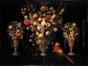 Tulips, Carnations, Irises, 
Daffodils, Hyacinths And Other Flowersin Three Ornamental Silver-gilt 
Standing Cups With A Parrot And Achained Squirrel