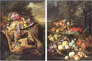 Still Life Of Figs And Grapes On
A Pewter Platter With A Basket Of Flowers On A Carpeted Ledge, With A
Wooded Landscape Beyond; Still Life Of Plums And Cherries In A Tazza
Resting On A Ledge With Wild Strawberries On A Large Leaf, A Basket With
Gr by Maximilian Pfeiler