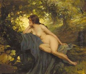 A reclining female nude in a sunlit glade by Allan Douglas Davidson