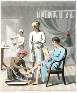 A Gentleman Dressing attended by his Head Bearer and other Servants by Charles D'Oyly