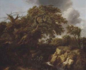 A wooded river landscape with travellers on a track by a cottage by Cornelius Decker