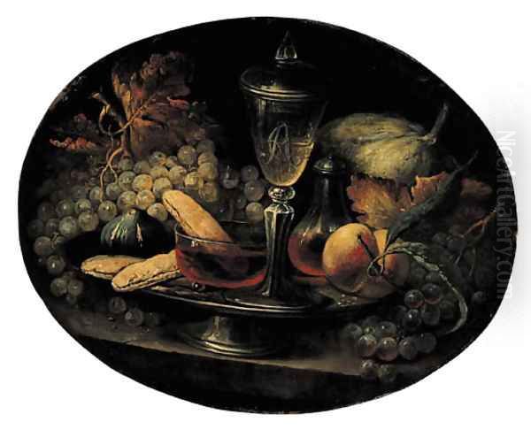 Grapes, a fig, breadrolls, wineglasses and a peach on a pewter plate - view 1