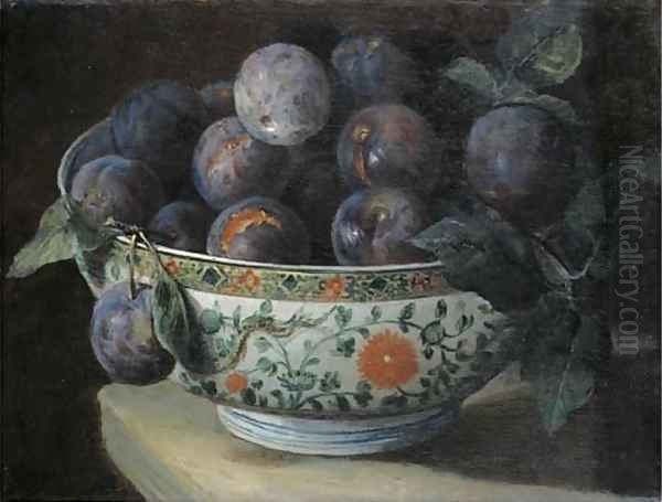 Plums in a Chinese porcelain bowl on a table ledge - view 1
