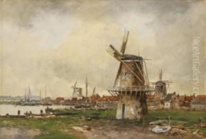 Windmills Near The Water's Edge