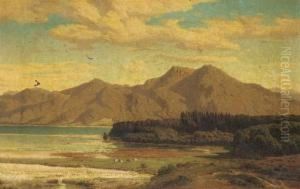 Cattle Grazing Before A Mountain Lake