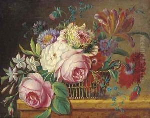 Roses, tulips and other flowers in a basket on a ledge