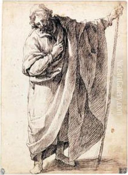 A Standing Figure Of A Man Wearing A Cloak And Holding A Stick - view 1