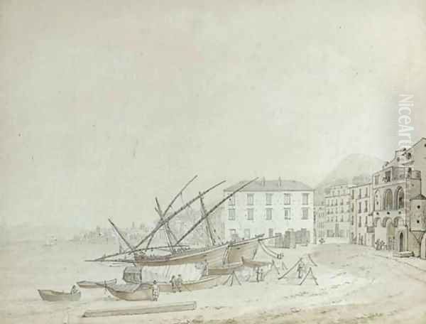 Fishing vessels moored on a beach in a Mediterranean town - view 1