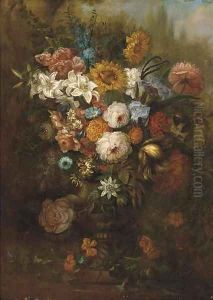 Roses, carnations, morning glory and other flowers in an urn on a ledge