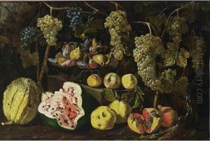A Still Life With A Watermelon, A
 Melon, Pomegranates, Peaches, And Grapes Together With Figs And Plums 
In A Basket On A Stone Ledge by Giovan Battista Ruoppolo