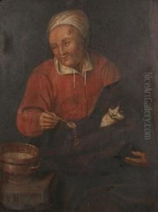 A Lady Feeding A Cat