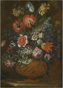 A Still Life With Various Flowers In A Bronze Urn On A Ledge