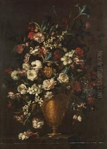 Irises, Roses, Poppies, Narcissi And Other Flowers In A Bronze Urn On A Ledge