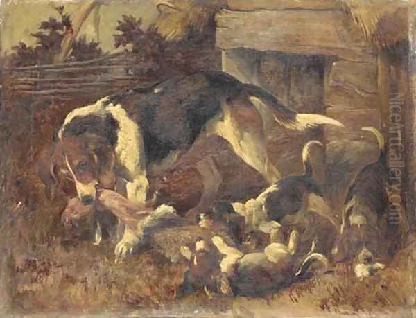 A hound and puppies with a fox's brush outside a kennel - view 1