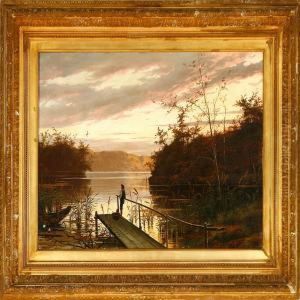 A Night Scenery With A Fisher Man At A Lake