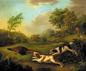 A huntsman with spaniels chasing a pheasant by Stephen Elmer
