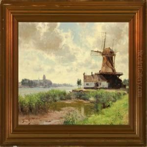 Vindmolle.dordrecht I Baggrunden