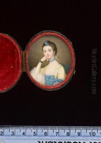 A Lady, Seated On A Green 
Upholstered Chair, Wearing Pale Yellow Open Robe Over Lace Trimmed Blue 
Dress Decorated With Bows On The Bodice, Matching Bow At Her Left Elbow,
 Large White Lace Cuffs, Double-strand Blue Choker Tied At The Back With
 A Ye - view 1