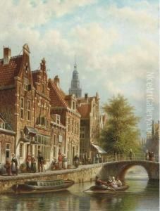 An Amsterdam Canal With The Westertoren Beyond