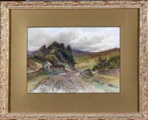 A View In The Lake District With A Road Running Near A Terrace Of Houses
