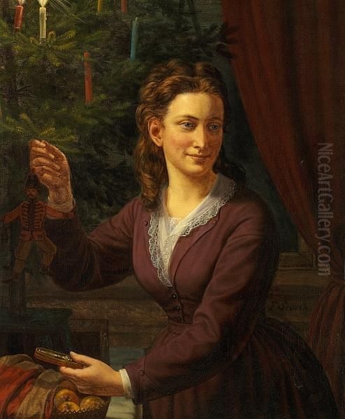 Young Woman Decorating The Christmas Tree - view 1
