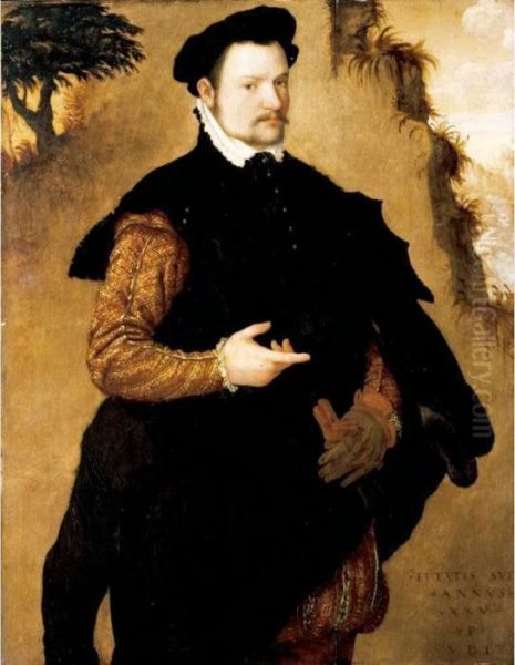 Portrait Of A Gentleman,
Three-quarter Length, Wearing An Elaborately Embroidered Doublet And A
Fur-trimmed Black Cape - view 1