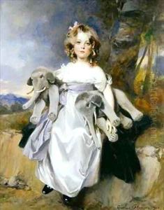 Portrait of a girl with toy elephants
